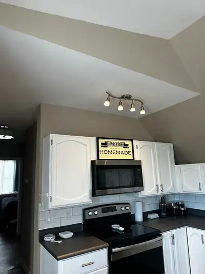 Large furnished 1 bedroom apartment with king bed . Parking 1 vehicle off street . Snow removal, gra...