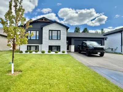 Step into comfort and style with this newly built lower unit in a beautiful duplex, located in one o...