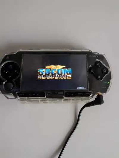 Sony PSP with games and moves, View more
