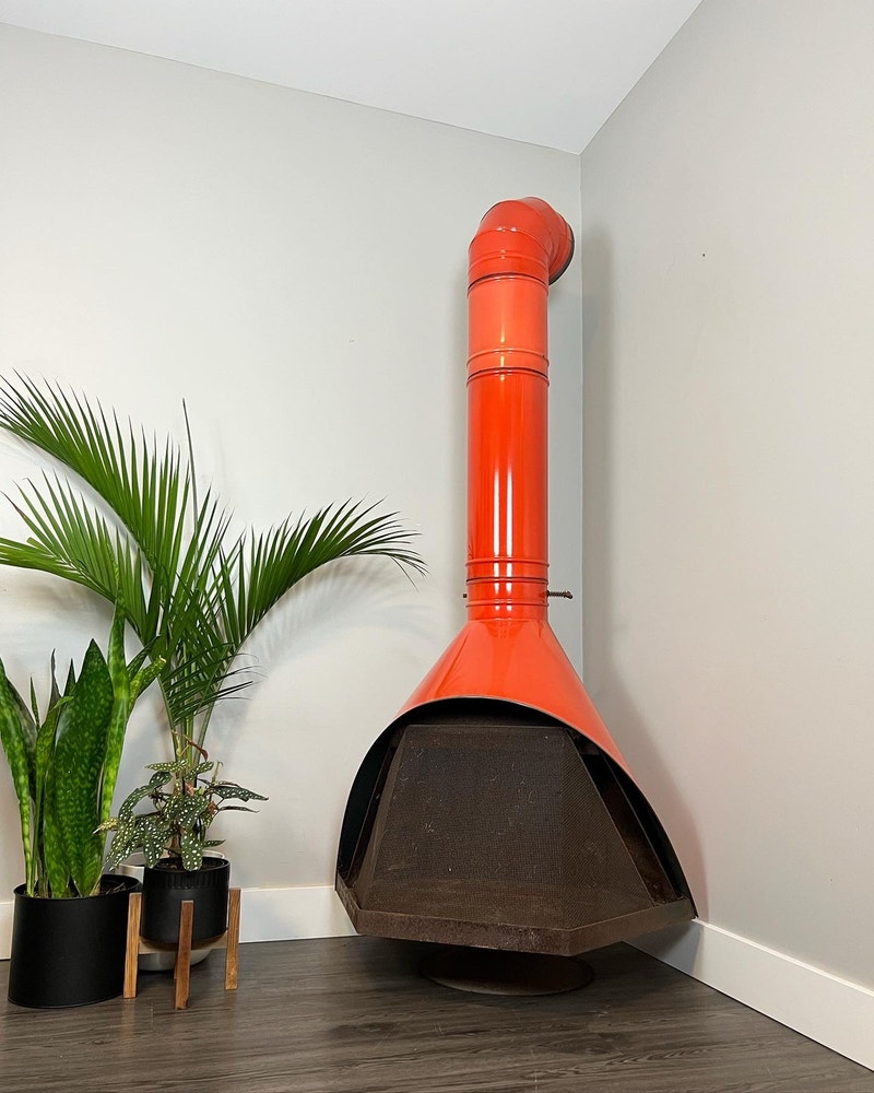 Classic mid century freestanding wood burning fireplace. Fireplace