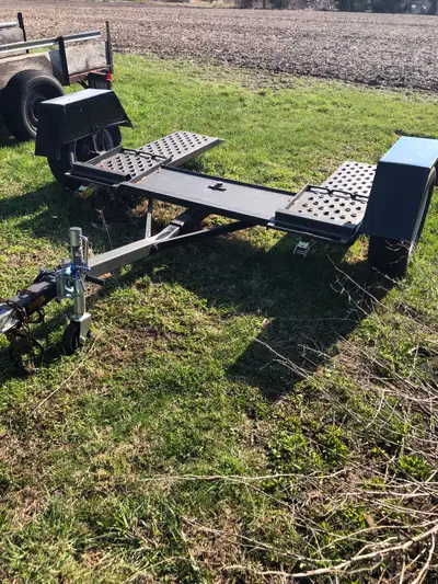 Just updated with new tires, new straps, new lights, new fenders. Tilt/ swivel deck. Works great. El...