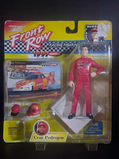 Own a piece of racing history with this 1997 Front Row Racing Figurine featuring Cruz Pedregon! This...