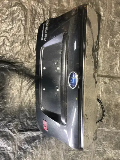 We have a used 2019 Subaru WRX STi Trunklid with Lip Spoiler in dark grey metallic colour in good ov...