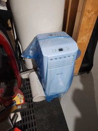 Window air conditioning unit / air climatisé – $450 OBO