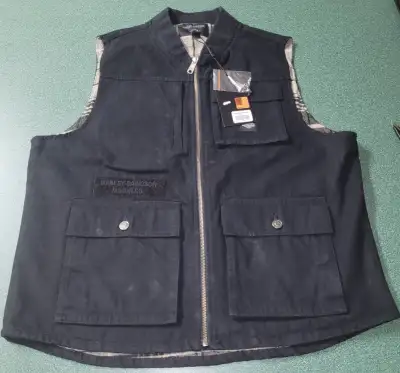 Harley Davidson Denim vest brand new tags on. Adult Large $80.00 Harley Davidson boot. Mens Size 13...