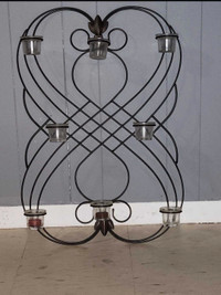 Large metal wall candle holder