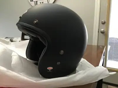 Brand new unworn BELL CUSTOM 500 helmet, flat black X-LARGE. to big, to expensive to send back.