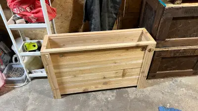 They are custom flower boxes. We do all sorts of handcrafted furniture off the side. We are selling...
