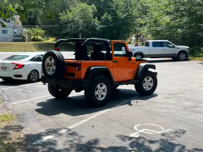 Jeep in excellent condition. Hardtop with removable T tops. Removable doors. Soft top, Bimini top. N...