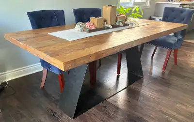 Wooden dining table with iron feature stand, View more