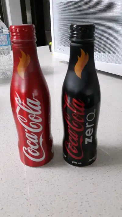 Collectable Aluminium Coca Cola Bottles, View more