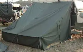 This is a New unused military canvas tent, perfect for camping or outdoor events. This tent is durab...