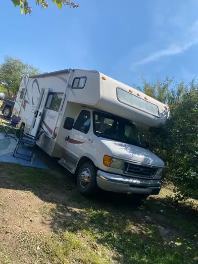PRICE REDUCED!!!! My new hobby.... Totally redone on the inside ... this motorhome is so cute and ho...