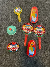 Vintage tin toy noise makers