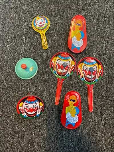 Vintage tin toy noise makers, View more