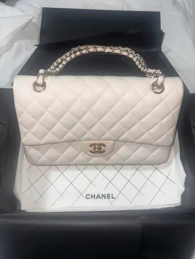 Two Chanel Classic Flaps for sale plus Others, View more