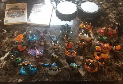 For sale is a used in good condition with the exception of 1 figure missing 1 arm skylander set (18...