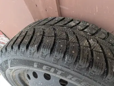 4 mounted and balanced studded winter tires with very little wear. Rims fit toyota Corolla, other To...