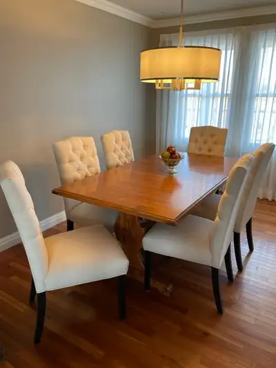 Stunning solid maple table, built to last a lifetime. In excellent condition. Looks beautiful with a...