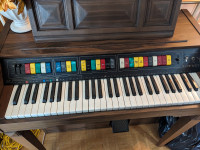 Lowry electric organ with bench