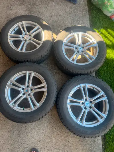 Selling 4 Blizzak Winter tires 2018 Ford Edge Rims 245/60/R18 Tires almost new, Rims in great shape...