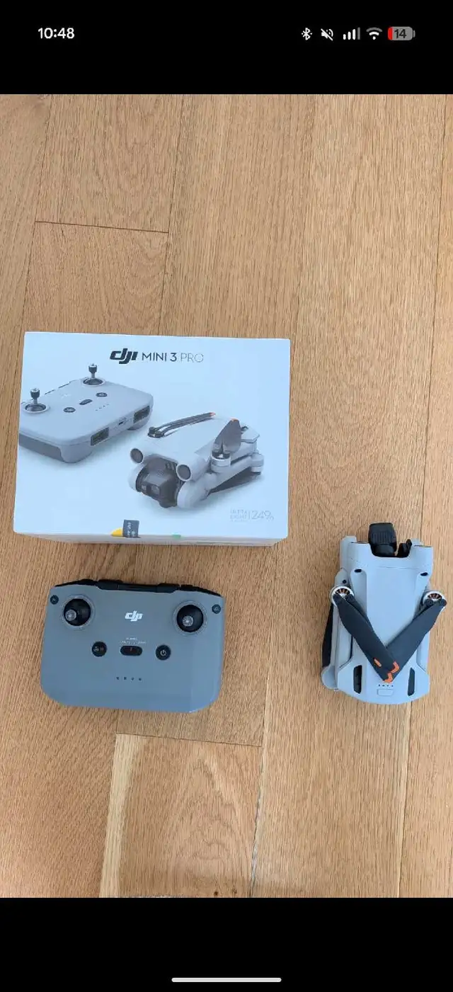 DJI Mini 3 Camera Drone (with battery and RC Remote)