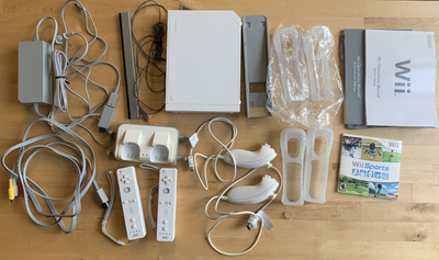 Nintendo Wii Bundle, 12 games, incl. DDR, Guitar Hero, Zumba, View more