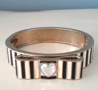 Striped Enamel and goldtone Bow Bracelet with crystal heart