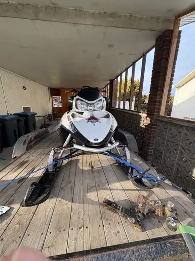 2010 Polaris dragon 800. New belly pan, track clips, sliders, rails, coolant reservoir, thermostat,...