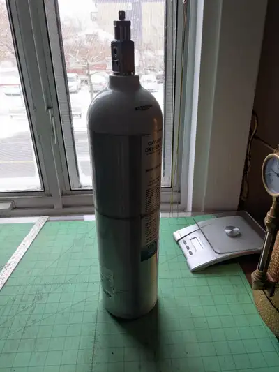 Used Small empty oxygen tank, View more