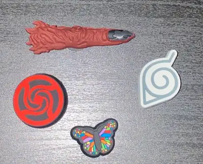 SELLING: 1 RAINBOW BUTTERFLY = $1.50 2 NARUTO LEAF CHARM = $1.50 3 JUJITSU KAISEN SUKUNA FINGER = $1...
