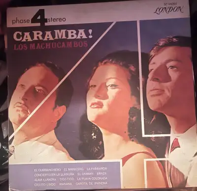 I'm offering a collection of vintage vinyl records, featuring various Latin American artists and gen...