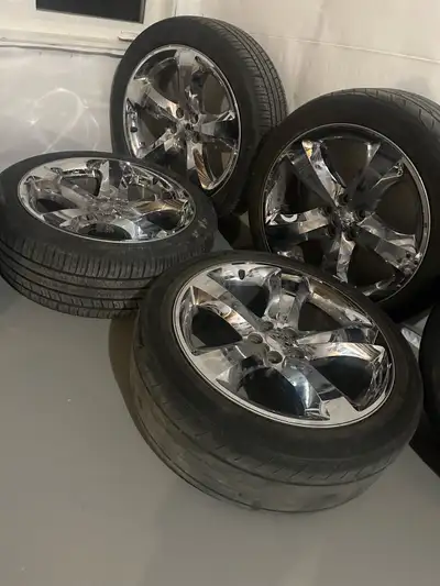Selling a set of 4 chrome alloy wheels that fit Chrysler 300 and Dodge Charger models. Includes 2 al...