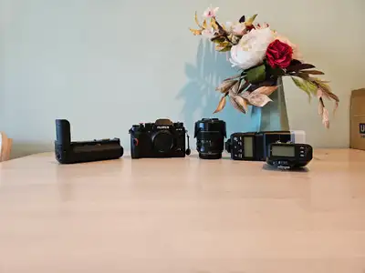 Comes with the XF 18-55mm F2.8-4 lens and the Vertical Power Booster grip as well as 3 batteries and...
