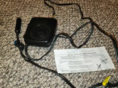 Portable vehicle heater. Comes with fuse.