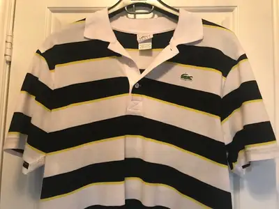 Designer short sleeve shirt only worn a couple of times. 100% Cotton. No rips or tears. Pick up in t...