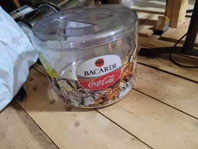 This Bacardi Coca-Cola branded circular plastic ice bucket is perfect for keeping your beverages chi...