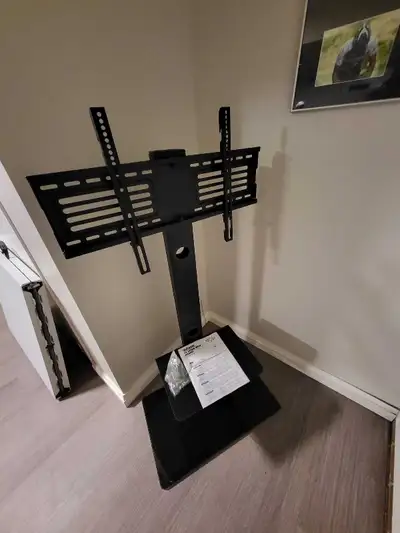 Sturdy free standing television mount for TVs from 32" - 65" and up to 110 lbs (50 kg). Mounting pat...