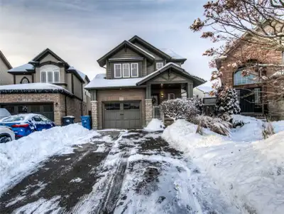 Gorgeous 3 bedroom house with an additional third floor level and legal finished basement apartment...