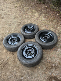 (4) 215/60/R16 All Season tires on 5X114 Steel Wheels