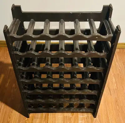 Stacking plastic wine racks. 7 single layers, each holding 6 bottles. Stack all 7 or spit them up to...