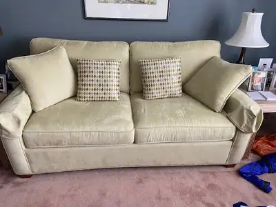 Green Hidabed and matching chair $450 cash FIRM Bridlewood SW
