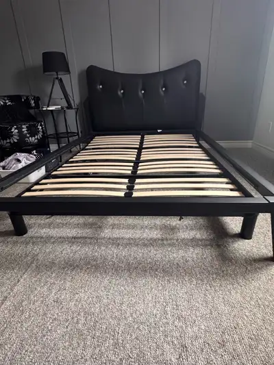 Black headboard for double bed. Like new, purchased from J.C Perreault. Non smoking home. Note: Elec...