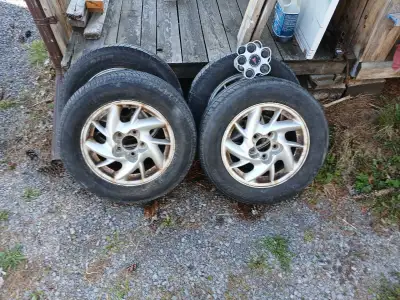 Off of Pontiac grand am 15 inch 2.5 × 5 x 15 bolt pattern With centre caps Tires will probably get t...