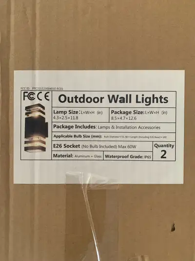 Brand new outdoor wall lights in packaging. It’s size is showing in packing, 2 lights in a box. It’s...