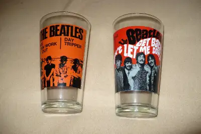 2 beatles tumblers $20 each beatles 2015, 16 month calendar never been used $25