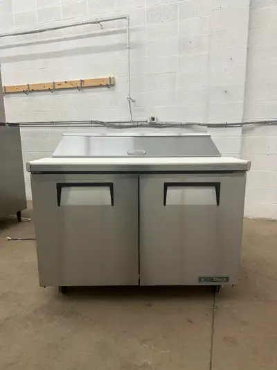 You are viewing a TRUE 2-Door Salad/Sandwich Prep Table TSSU-48-12-HC. Overall measurements are 48.3...