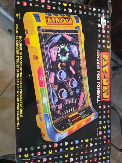 Like new, very lightly used pac-man pro arcade game. Decorative stickers all included, power cord an...