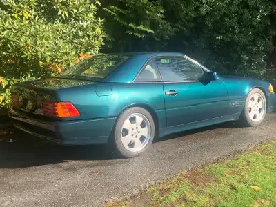 Beautiful 1995 Mercedes 600SL in rare Brilliant Emerald Metallic with tan leather interior. New blac...