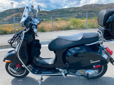 Excellent condition, new Michelin tires and drive belt, over $2000 in accessories including Akrapovi...